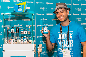 ALT Text: The founder of Benjilock posing for the picture next to his product